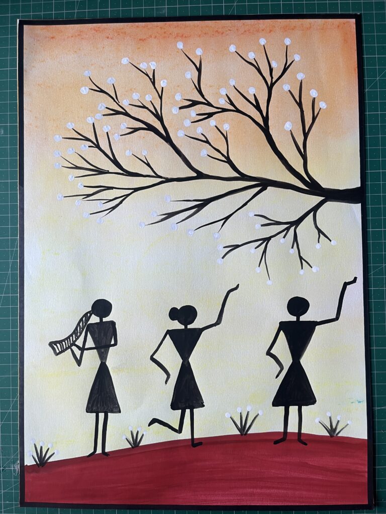 Handmade Warli art painting with tribal figures dancing under a tree at sunset