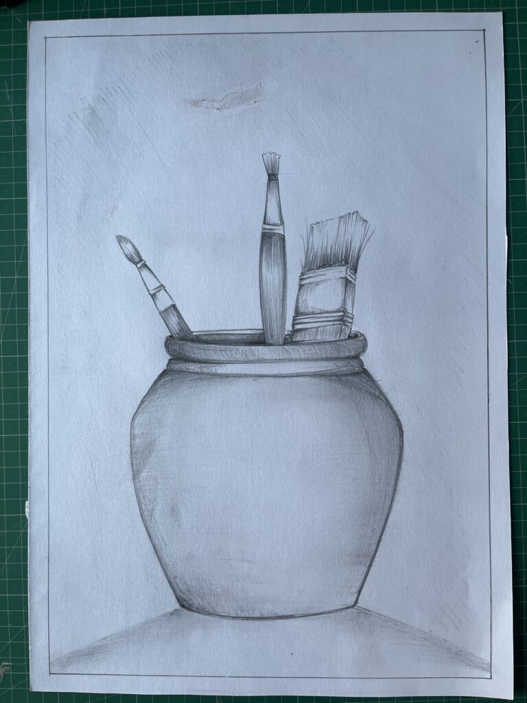 Handmade pencil sketch of a clay pot with paint brushes – still life drawing