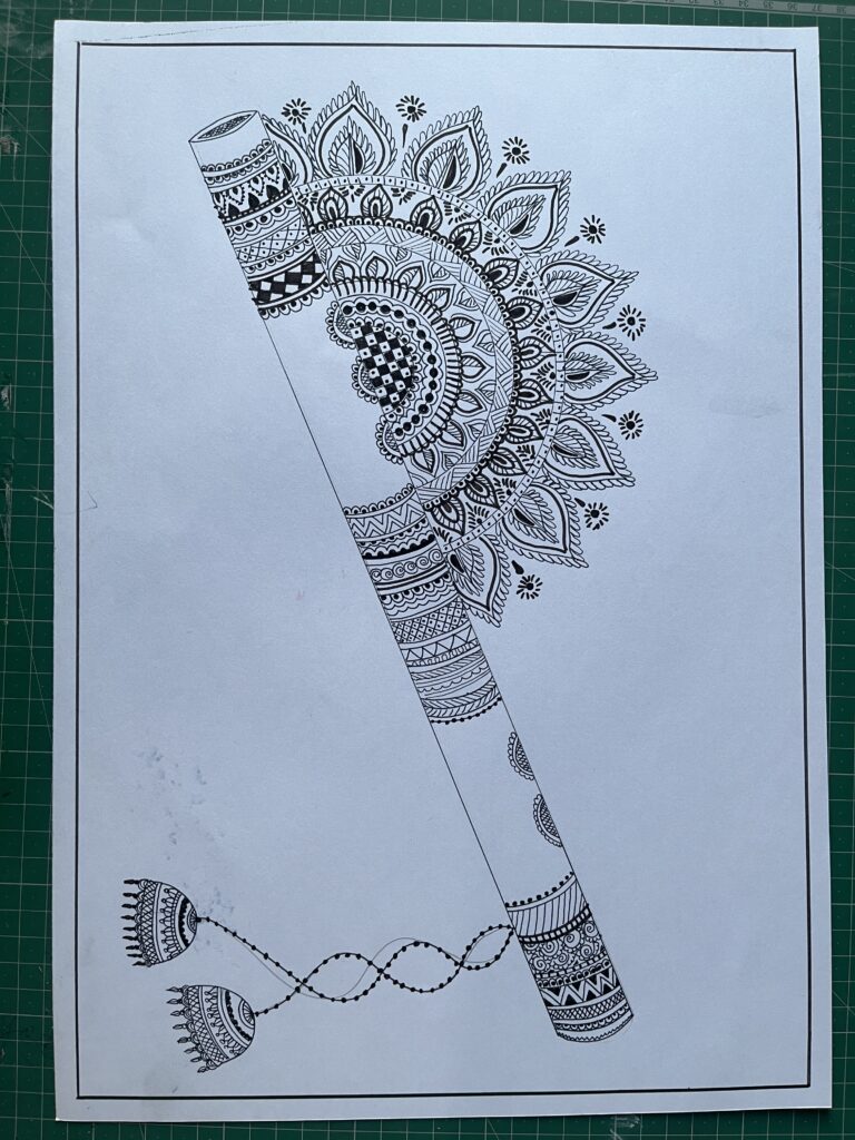 Handmade mandala art design on dandiya stick with intricate mehndi-style patterns